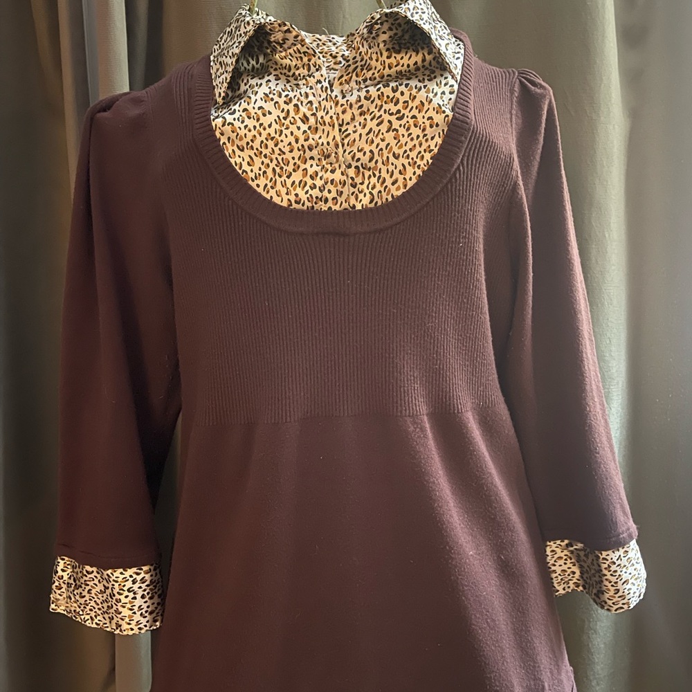 Lightweight brown sweater w/mock collar and cuffs in brown/tan/black pattern.